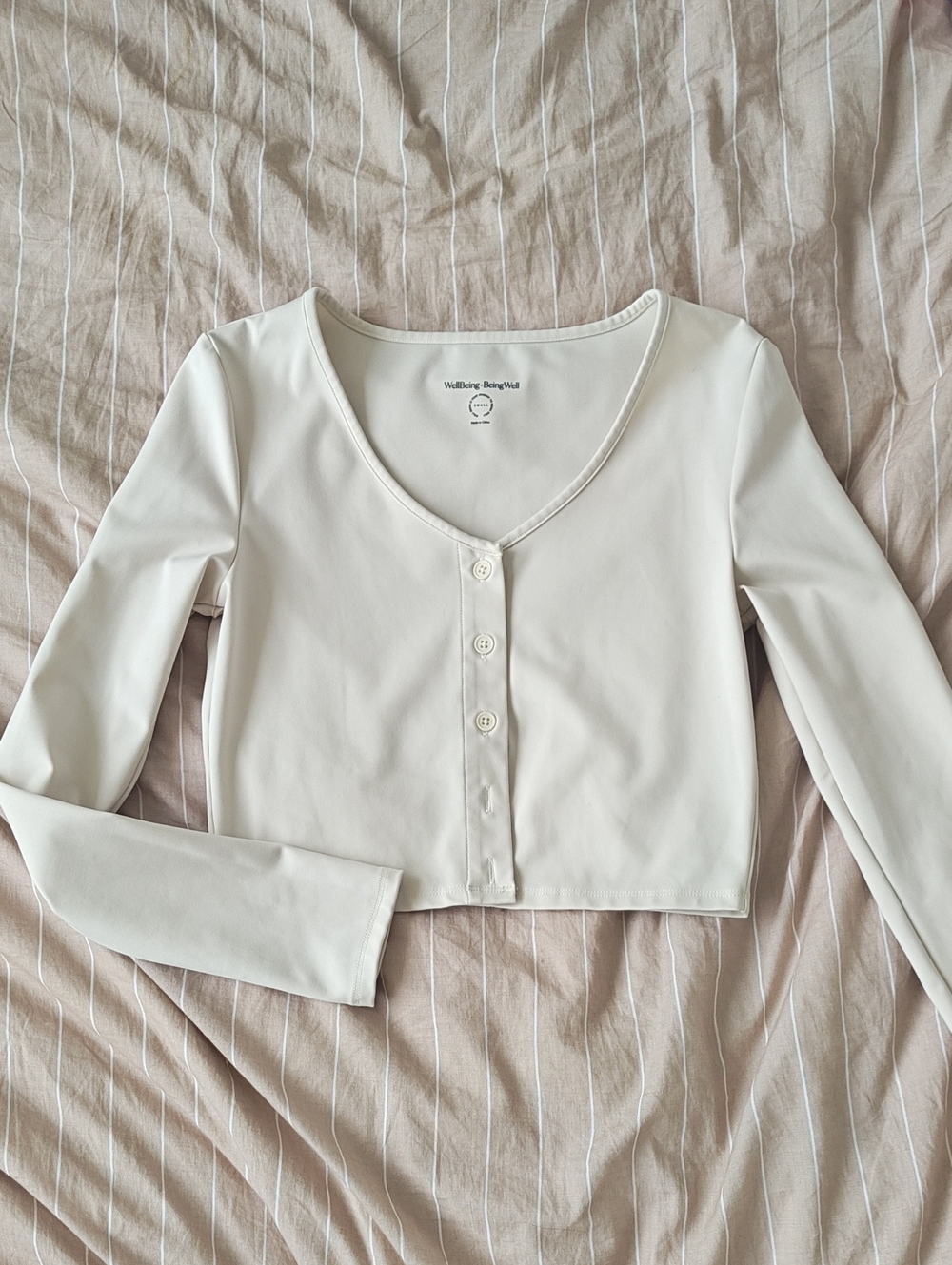 REVOLVE Cream Long-Sleeve Crop Button Top